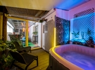 Lounge area with spa and heated pool €70